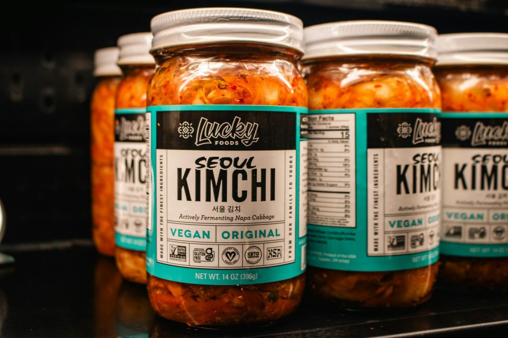 Gut Health After Antibiotics: How to Support Recovery 2 Jars of fermented food that help support gut health after antibiotics