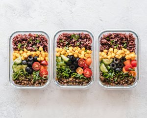 Home 35 Glass containers of rice, lentils and vegetables for a weight loss plateau meal plan